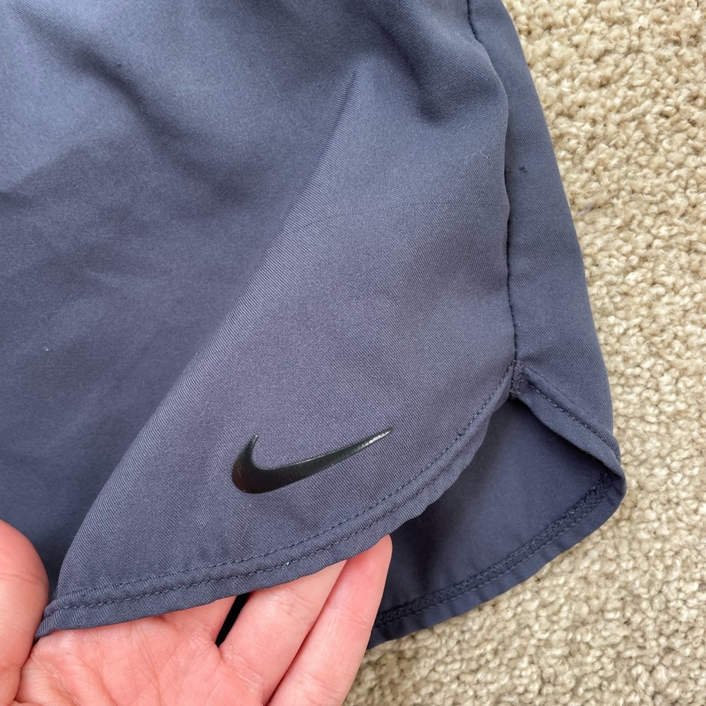 muted blue nike women’s running / workout shorts